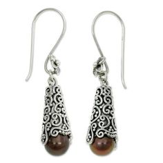 Beautifully modern these earrings reveal extravagant silver arabesques. Buana adds brown cultured pearls in a design of modern enchantment. .925 Sterling silver Elegant Brown Dangle Earrings, Elegant Brown Pierced Teardrop Earrings, Elegant Brown Teardrop Pierced Earrings, Brown Dangle Jewelry For Formal Occasions, Brown Pearl Drop Earrings For Gift, Brown Pearl Drop Earrings As Gift, Brown Teardrop Earrings For Formal Occasions, Formal Brown Sterling Silver Earrings, Elegant Brown Teardrop Earrings For Gift