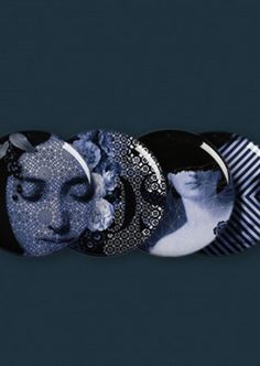 three buttons with images of women in different colors and sizes on them, one has her eyes closed while the other has her head down