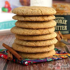 a stack of cookies sitting on top of a wooden table