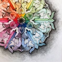 a drawing of a rainbow colored flower with the petals arranged in four different colors on it