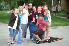 a group of young people posing for a photo