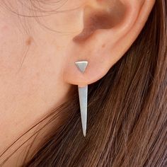 Triangle Ear Jacket. Ready to wear post earrings that are modern, bold and streamline. These triangle Ear Jackets make a great ready to wear gift for all ages! The small triangle sits on the front of the ear, while the long triangle sits behind your ear. Add a striking, geometric finishing touch to your look with this Geometric Silver Jewellery, Ring Geometric, Ring Engraving, Silver Ear Climbers, Jacket Earrings, Front Back Earrings, Silver Jewellery Indian, Ear Jacket Earring, Packing Jewelry