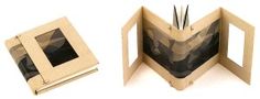 an origami photo album is opened to show the pages