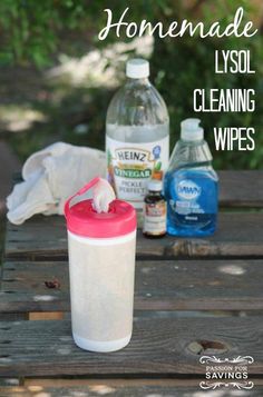 homemade lysol cleaning wipes sitting on a picnic table