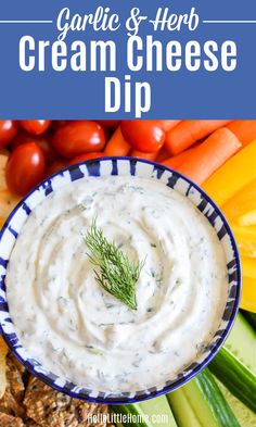 a blue and white bowl filled with cream cheese dip