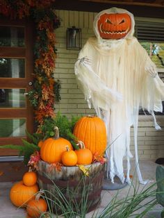 there is a halloween decoration on the front porch