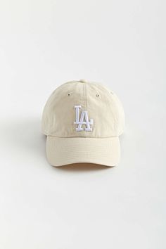 Paneled baseball cap by ’47 Brand with a logo embroidered at the front. Features a curved brim & finished with an adjustable strap at the back. Features Baseball hat from '47 New York Dodgers embroidery Adjustable strap closure Content + Care 100% Cotton Spot clean Imported Size Circumference: Adjustable | '47 Los Angeles Dodgers Baseball Hat in Tan at Urban Outfitters Dodgers Baseball, Pink Fits, 47 Brand, Los Angeles Dodgers, Baseball Hat, Baseball Caps, Logo Embroidered, Travel Style, Lifestyle Brands