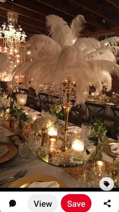 a table is set with candles and centerpieces for an elegant dinnereon party