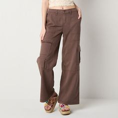 Stay on-trend with these Arizona Jean Co. women's and junior's low-rise straight-leg cargo pants. They're made from cotton-twill for a baggy-fit and have a button-zip fly and multiple pockets. Style them with your favorite crop top. Front Style: Flat FrontFeatures: Fly FrontClosure Type: Button & ZipperFit: Baggy FitPockets: 1 Cargo Side Pocket, 2 Front Zip Pockets, 2 Front Slip Pockets, 2 Back Flap PocketsRise: Low RiseSupport: Light SupportFiber Content: 52% Cotton, 48% Tencel LyocellFabric De Brown Corgo Pants, Brown Cargo Pants, Women Cargo Pants, Chic Fall Outfits, Pants Cargo, Cargo Pant, Baggy Fits, Side Pocket, Cargo Pants