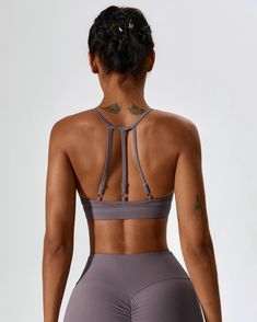 Made from our signature naked fabric Moderate support sports bra High neckline Adjustable shoulder straps Racer back silhouette Open back design 4 way stretch Sweat wicking and breathable Model: Bust 88cm, Waist 60cm, Hip 102cm, Height 174cm, Weight 55kg, Wears size S Our High Neck Open Back Sports Bra is a slinky design that moves with your body and allows for ultimate second skin comfort. Cut to a standard sports bra length, it is a racer back design with multiple adjustable straps. 4-way Stretch Sports Bra With Straps For Gym, Sports Bra With Straps For Workout, Gym Sports Bra With 4-way Stretch Straps, Sports Bra With 4-way Stretch And Strappy Back, Nylon Yoga Activewear With Straps, Strappy Back Sports Bra With Stretch, Strappy Back Nylon Sports Bra For Workout, Sports Bra With Strappy Back And Stretch, Nylon Strappy Back Sports Bra For Workout