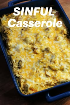 a casserole dish with meat and cheese in it on a wooden table top