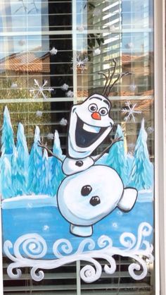 an image of a window with a frozen snowman painted on it