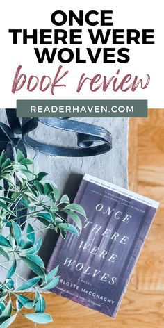 a book sitting on top of a table next to a potted plant with the title once there were books