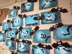 a group of paintings with bats hanging on the wall