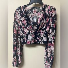 Fashion Nova Floral Cropped Pleated Blouse Size: Small Color: Floral/ Black New With Tags Chic Floral Print Tops For Night Out, Floral Print Crop Top For Party, Fitted Floral Print Blouse For Night Out, Long Sleeve Floral Print Top For Party, Elegant Floral Print Tops For Date Night, Fall Date Night Top With Floral Print, Floral Print Long Sleeve Top For Night Out, Long Sleeve Floral Print Tops For Night Out, Floral Print Blouse For Night Out In Fall