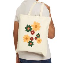 tote bag, reusable shopping bag, everyday bag, birthday gift, artsy bag, mother's day gift, floral pattern bag, artsy bag, washable bag This 100% cotton bag comes in one size - 15" x 16"- perfect for everyday wear. While the canvas material will show off your designs in great colors, it's durable and will last for years. The bag features 20" handles (made from the same canvas), making it easy to carry even with a week's worth of shopping. .: 100% cotton canvas .: Heavy fabric (12 oz/yd² (406.9 g/m .: Sewn-in label .: Available in natural and black colors Eco-friendly Floral Print Canvas Bag For Everyday Use, Artistic Cotton Canvas Bag As Gift, Spring Cotton Bags Perfect As Gifts, Spring Cotton Bags For Gifts, Spring Gift Cotton Bag, Spring Gift Cotton Bags, Spring Cotton Gift Bags, Eco-friendly Tote Canvas Bag For Mother's Day, Floral Print Cotton Bag For Gift