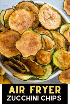 air fryer zucchini chips in a white bowl with the title above it