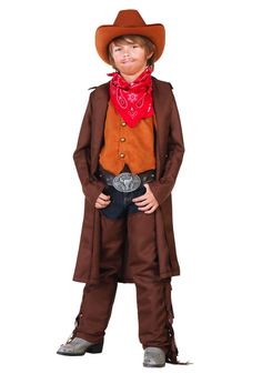 a little boy dressed up in a cowboy outfit