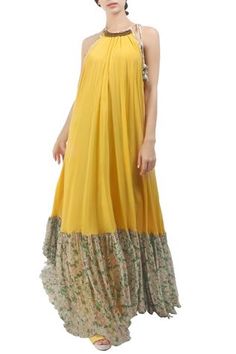 Shop for Nikasha Yellow Halter Maxi Dress for Women Online at Aza Fashions Spring Georgette Maxi Dress With Ruffles, Summer Georgette Maxi Dress With Ruffles, Sleeveless Georgette Dress With Ruffles, Yellow A-line Maxi Dress With Ruffles, Spring Floor-length Georgette Maxi Dress, Flowy Georgette Sleeveless Maxi Dress, Flowy Floor-length Dress With Ruffle Hem, Floor-length Summer Dress With Ruffle Hem, Summer A-line Georgette Dress