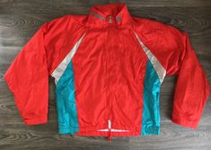 Red Retro Track Jacket For Outdoor, Retro Red Track Jacket For Outdoor, Vintage Red Track Jacket For Outdoor, Retro Red Windbreaker For Sports, Retro Red Sports Windbreaker, 90s Red Sports Windbreaker, 90s Style Red Sports Windbreaker, 90s Style Red Windbreaker For Sports, Retro Red Hooded Windbreaker