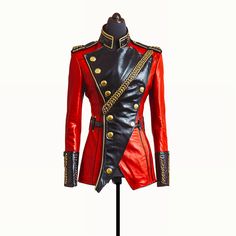 This jacket features a striking design inspired by military and hussar aesthetics. It combines vibrant red and sleek black leather, creating a bold contrast. The front is asymmetrical with a black leather panel adorned with large, decorative gold buttons. Gold braided detailing runs diagonally across the chest, adding a touch of regality. Structured epaulettes and a high stand-up collar, both trimmed with gold, enhance the jacket's commanding look. The cuffs also feature black leather with gold Edgy Fitted Leather Jacket For Cosplay, Fitted Leather Jacket For Stylish Wear, Fitted Punk Leather Jacket For Cosplay, Fitted Leather Biker Jacket For Cosplay, Red Fitted Outerwear For Alternative Fashion, Fitted Red Outerwear For Alternative Fashion, Red Leather Punk Outerwear, Red Fitted Punk Outerwear, Punk Mode