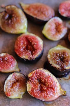 figs cut in half sitting on a table