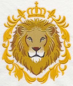 a lion with a crown on it's head is embroidered onto a white t - shirt