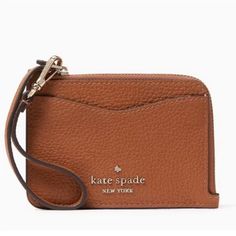 Brand New With Tag Color: Gingerbread Kate Spade Leila Small Card Holder Wristlet Wallet 3.5"H X 4.5'wx 0.65"D Pebbled Leather Ksny Metal Pinmount Logo Lining: Two-Way Spade Jacquard Key Ring 2 Credit Cards Slots Slip Pocket On Front Zip Closure Dust Bag Not Included Imported Style # Wir00398 Cheap Kate Spade Wallets With Card Slots, Kate Spade Clutch, Spade Logo, Kate Spade Card Holder, Vintage Kate Spade, Leather Bifold Wallet, Kate Spade Wallet, Kate Spade Accessories, Wristlet Wallet