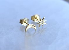 Gold Moon & Star Studs:-18k Gold over .925 sterling silver-Moon measures 8mm x 4mm, Star is 6mm x 6mm, with 1.5mm diamond pave crystals.-Sold as a pair with butterfly backings. Connect with us on Instagram @a_wild_violet for sales and giveaways!**All items are in stock and ship within 2-5 business days from received payment (excluding Saturday/Sunday) from the US. If you are within the US please expect 3-7 business days for shipping transit and delivery. International orders please expect a minimum of 2 weeks for delivery and upwards of 2-6 weeks for transit and delivery during the holiday season. Shipping upgrades are available during checkout. All designs and content copyright © 2009-2023 A Wild Violet. All rights reserved. Gold Celestial Earrings With Diamond Accents, Celestial Gold Earrings With Diamond Accents, Celestial Earrings With Diamond Accents For Anniversary, Celestial Diamond Earrings As Gift, Star Earrings Stud, Gold Moon, Silver Moon, Moon Star, Star Studs