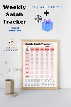 a poster with the words weekly saalh tracker and a gift box next to it