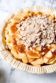 an apple pie with powdered sugar on top