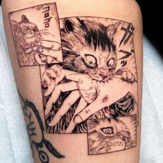 a close up of a person's arm with tattoos on it and a cat