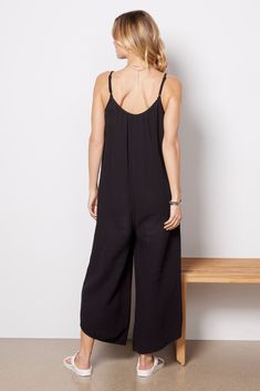 Looking chic is effortless with this Z Supply jumpsuit. Crafted in breezy gauze fabric with a flowy, relaxed fit, this versatile jumpsuit features side pockets, adjustable straps, and angled hems. Add a sun hat and slides for the perfect summer look. | Z SUPPLY Women's Flared Gauze Jumpsuit, Size XL, Black Loungewear Jumpsuits With Adjustable Spaghetti Straps, Loungewear Jumpsuits And Rompers With Spaghetti Straps, Chic Jumpsuits And Rompers With Adjustable Straps For Vacation, Black Spaghetti Strap Jumpsuits And Rompers For Loungewear, Spaghetti Strap Jumpsuits For Loungewear, Black Spaghetti Straps Jumpsuits For Loungewear, Beach Jumpsuits And Rompers With Adjustable Straps, Chic Solid Jumpsuits And Rompers With Adjustable Straps, Chic Jumpsuits And Rompers With Adjustable Straps