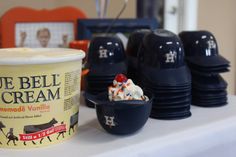 an ice cream sits on a table with other items