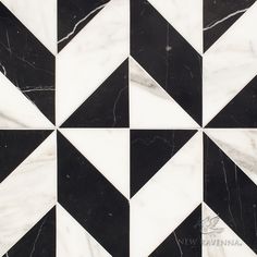 a black and white checkerboard pattern with marble inlays on the floor