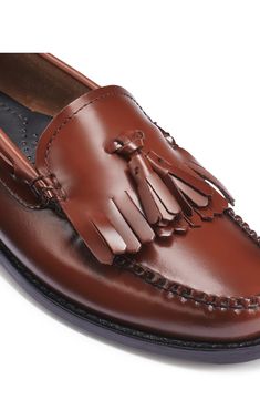 A kiltie vamp and swingy tassels add eye-catching detail to this moc toe-loafer that'll elevate your work or weekend ensembles. Leather upper, lining and sole Imported Classic Brown Oxfords With Tassels, Classic Brown Tassel Loafers For Fall, Brown Classic Tassel Loafers For Fall, Goodyear Welted Slip-on Tassel Loafers, Brown Tassel Loafers With Leather Sole For Semi-formal Occasions, Brown Tassel Loafers With Leather Sole For Semi-formal, Brown Tassel Slip-on Loafers With Leather Lining, Classic Fashion Looks, Brown Semi-formal Tassel Loafers With Leather Sole