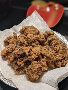 a plate full of cookies sitting on top of a table