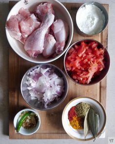 the ingredients for this dish include chicken, tomatoes, onions and other things to make it