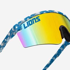 You've got it made in these shades. Kick back, relax, and support your squad in style with the Detroit Lions Floral Large Frame Sunglasses. Features Shield sunglasses with gradient lenses, the perfect look for every sunny day Floral, team-colored design on rim and temples so you can rep the team in style Printed wordmark team name display on upper corners of lens, in case there were any doubts where your allegiances lie Comfortable nose pad to keep you comfy on those extended afternoons outdoors Multicolor Shield Sunglasses For Sports With Tinted Lenses, Multicolor Tinted Shield Sunglasses For Sports, Sporty Sunglasses With Mirrored Lenses For Sports, Multicolor Shield Sunglasses With Uva Protection For Sports, Summer Sports Sunglasses With Gradient Lenses, Sporty Multicolor Sunglasses With Uv Protection, Multicolor Tinted Sports Sunglasses, Multicolor Tinted Sunglasses For Outdoor Activities, Sporty Multicolor Anti-reflective Sunglasses