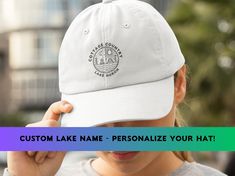 Looking for a stylish and comfortable baseball cap that showcases your love for the lake life? Look no further than our Cottage Country Baseball Cap! Crafted from high-quality materials, this cap features a classic design with a curved brim and adjustable strap to ensure a perfect fit. The printed custom lake region on the front adds a touch of personality and shows off your passion for all things lake-related. Whether you're spending a day on the water or just lounging on the shore, this cap wi Curved Bill Hat With Custom Logo For Outdoor, Casual Outdoor Hat With Custom Logo, Outdoor Hat With Custom Logo And Curved Brim, Country Hat, Custom Baseball Cap, Country Hats, Hat Custom, Lake Cottage, Hat Summer