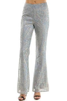 Shine bright this season with our sequin flare pants, available in silver. 100% Polyester Sequin Flare Pants, Silver Pants, Flare Pant, Pants Large, Shine Bright, Flare Pants, Sequin, Wardrobe, Pants