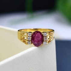 ◆Ring details: < Theme:Romantic Wedding & Engagement 1: Metal Type: 14KT/18KT, White Gold/Rose Gold/Yellow Gold 2: Main Stone < Center Stone : Natural Ruby < Size: 6x8 mm  < Shape: Oval 3: Side Stones Stone: Moissoinites  ◆Purchase Policy: < 30 days Refund Guarantee; < Free Shipping; < Free Gift Box & Packing ◆Please contact us if you need service: < Engraving; < Metal Change; < Ring Resizing; < Custom order. ◆Processing time: < Items are subject to processing time of approx 3-5 Days as all the items are made to order. ◆Return Policy: < If you need to return the item, please contact us first. < 30 days money back return policy (except custom or personalised orders); < Items must be returned in an unused (original) state. We reserve the right to refuse to return items that we believe are no Dainty Gold Engagement Ring, Wedding Ring Dainty, Engraving Metal, Natural Ruby Ring, Box Packing, Ruby Jewelry, Gold Engagement Ring, Ring Dainty, Ring Gemstone