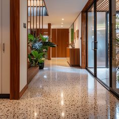 the hallway is clean and ready for us to use as an entrance way in this modern home