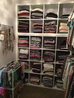 the closet is full of clothes and other items