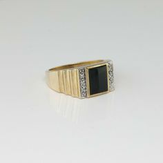 10K Yellow Gold Black Onyx and Diamond Ring, 10 round diamond white gold sets, with rectangular 8x10mm black onyx center 3/8 inch across, Ring size 11, Circa 1950, 6.5 grams SKU # BB287MR20 This listing contains photographs of the actual item you will receive. Our items are in excellent condition with little or no signs of wear and many are one of a kind pre-owned estate finds. Please look closely at the pictures in this listing as they are part of the product description. Please read the descri White Gold Set, Fine Jewelry Designers, Blue Topaz Ring, Topaz Ring, Pink Tourmaline, Druzy Ring, Black Onyx, Gold Black, Diamond White