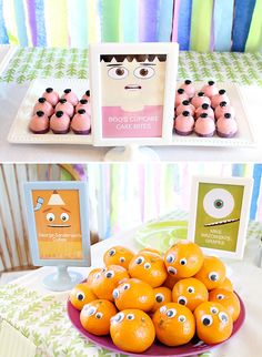 there are many oranges with googly eyes on them and in the middle one is a box of donuts