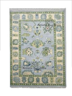 an antique rug is shown in blue and green colors, with the words artistic rug store on