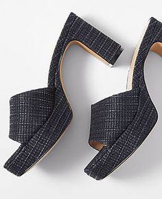 Step into sophistication with the Ann Taylor Platform Mule Sandals, a perfect blend of style and comfort for the modern woman. These sandals feature:

- Size: 8
- Color: Black
- Gender: Female
- Material: 45% Cotton, 35% Nylon, 20% Jute
- Open toe design
- Padded footbed for enhanced comfort
- Heel Height: 3 1/4 inches

Crafted from a textured leather-like blend of cotton, nylon, and jute, these platform mules offer a chic look with a substantial heel to elevate any outfit. Whether you're headin Modern Heels With Textured Footbed And Round Toe, Chic Mules With Textured Footbed And Round Toe, Chic Round Toe Mules With Textured Footbed, Modern Summer Heels With Textured Footbed, Modern Textured Footbed Heels For Summer, Chic Wedge Heels With Textured Footbed, Chic Open Toe Heels With Textured Sole, Formal Open Toe Heels With Textured Sole, Chic High Heel Sandals With Textured Sole