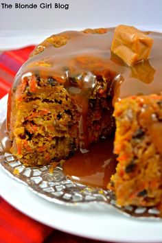 there is a cake that has been cut in half and covered with caramel icing