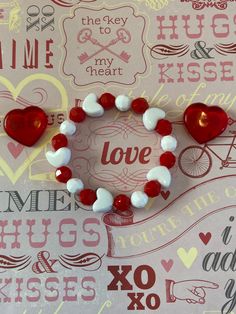 This is a Valentine heart bracelet. It would make a cute gift for a little girl for Valentines Day. It would make a cute addition to a little girl's Valentine outfit. It has five white heart pony beads. It has solid white and red 8mm faceted beads. It was made with .8mm sturdy stretch sting. I tie it several times to prevent breakage. It fits girls ages 5-8. It stretches to fit on the wrist. All items are ready to be shipped I do combined shipping. Items ship in 2-5 business days. Check out more Gifts Bracelets, Girls Bracelets, Girls Valentines Outfit, Gifts For Valentines, Bracelets For Kids, Bracelets For Girls, Letter Bead Bracelets, Candy Bracelet, Bracelet Heart